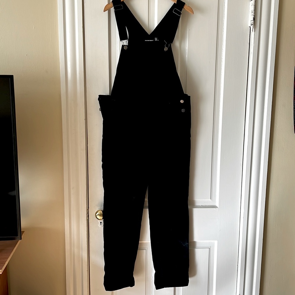 I'm selling black American Apparel overalls.